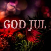 God jul i julefarger, en nydelig julehilsen og julebilde