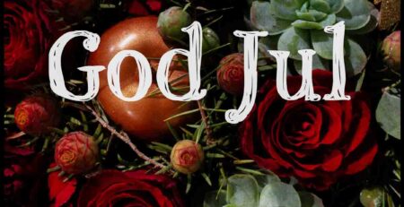 God jul med roser, bilde av en juledekorasjon med skriften God Jul