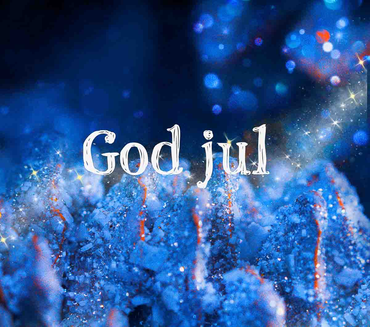 God Jul i blå God Jul i blå, rimdekket kongle med fargene blå og orange.